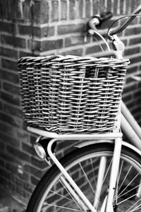 Close-up of bicycle against wall