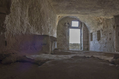 Old building seen through arch window