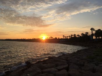 Scenic view of sea against sky during sunset