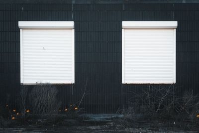 Closed window of abandoned building