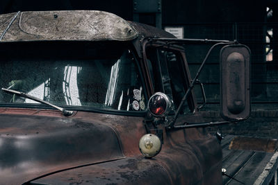 Close-up of old rusty car