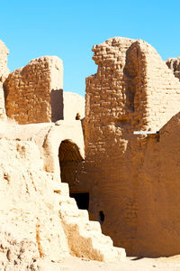 Low angle view of old ruin building