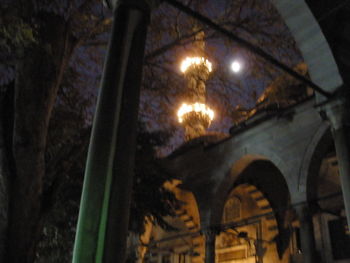 Illuminated street light at night