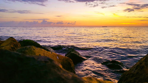 Scenic view of sea during sunset