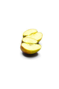 Close-up of yellow fruit against white background