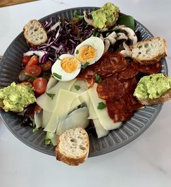 High angle view of breakfast served on table