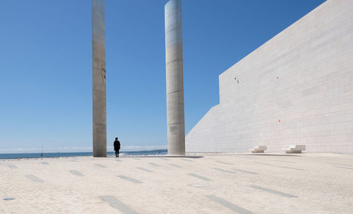 Man against clear blue sky