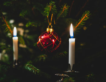 Close-up of illuminated candle