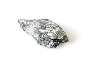 Close-up of rock against white background
