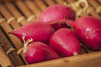 High angle view of radish in wooden tray