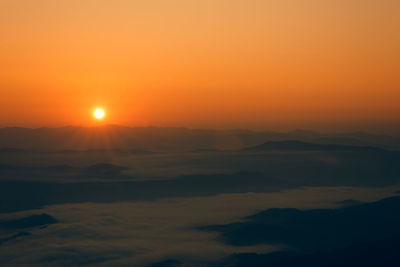 Scenic view of dramatic sky during sunset