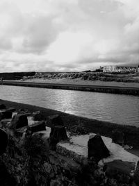 View of river against cloudy sky