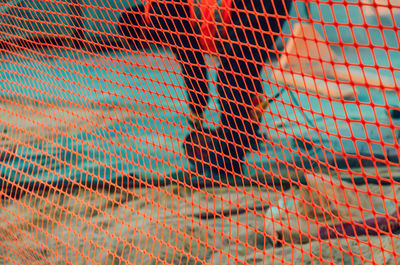 Red mesh for road works. abstract background. blur