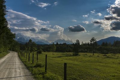 Road passing through field