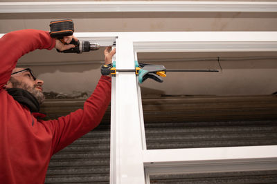 Side view of man working