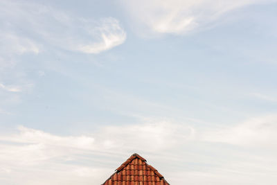 Low angle view of roof against sky