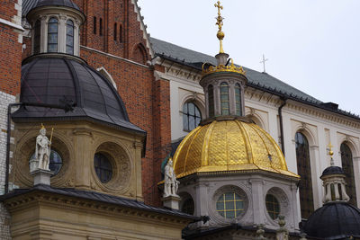 Low angle view of ornate building against sky