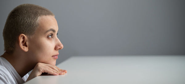 Portrait of teenage girl looking away