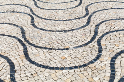 Full frame shot of curvy patterned footpath