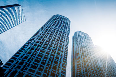 Low angle view of modern buildings against sky