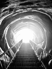 Low angle view of staircase in tunnel