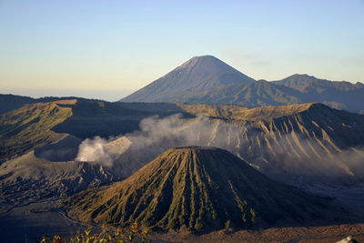 Scenic view of volcanic landscape against sky