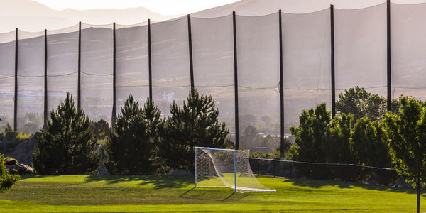 Scenic view of soccer field against sky