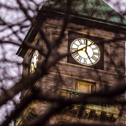 Low angle view of clock