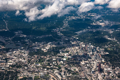 Aerial view of cityscape against sky