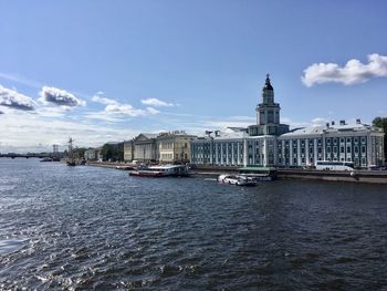 Tourist boat sails along rivers and channels among the sights of sankt - petersburg