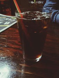 Close-up of beer glass on table