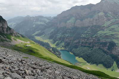 Scenic view of landscape and mountains against sky