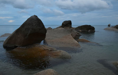 Scenic view of sea against cloudy sky