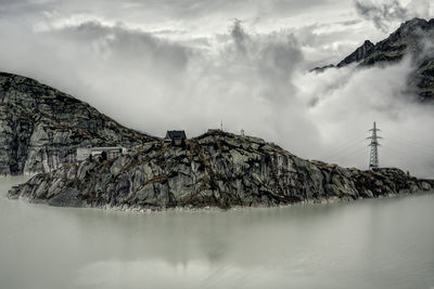 Scenic view of mountains against sky during winter