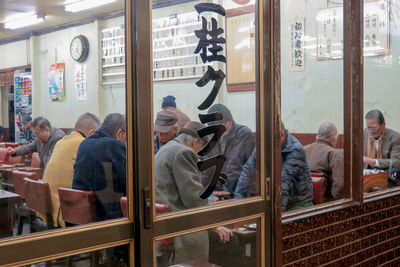 Group of people in front of building