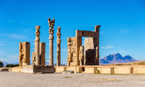 Old ruins against blue sky