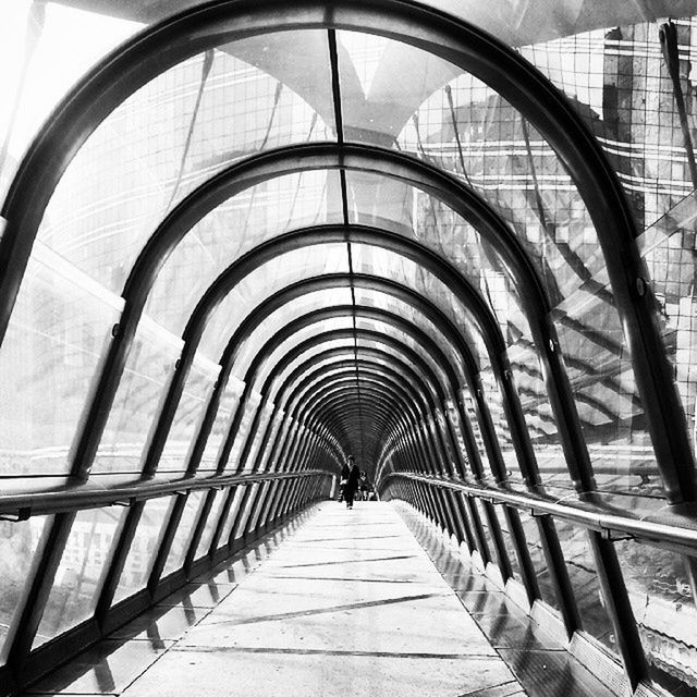 the way forward, architecture, built structure, diminishing perspective, indoors, arch, walking, railing, vanishing point, full length, rear view, men, footbridge, building exterior, pedestrian walkway, narrow, steps, walkway