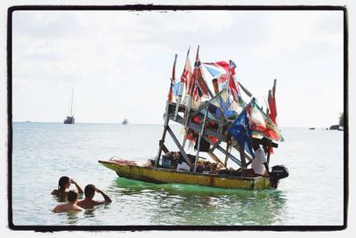 Boats sailing in sea