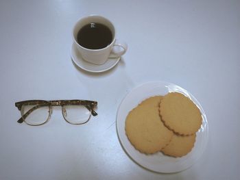 Close-up of coffee cup on table