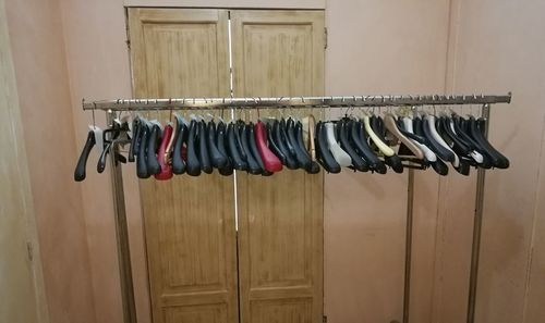 Clothes hanging against wall