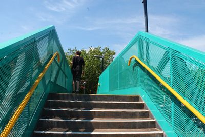 Low angle view of staircase against sky