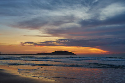 Scenic view of sea against sky during sunset