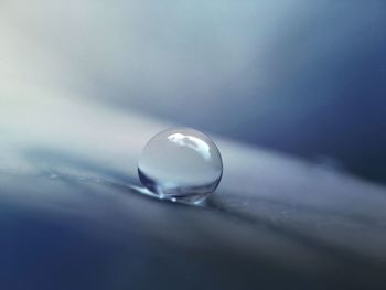 Close-up of water drop on table