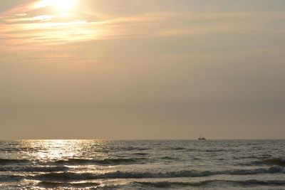 Scenic view of sea at sunset