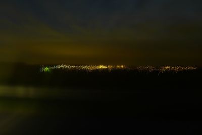 Illuminated cityscape at night