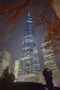 Low angle view of man standing at office building