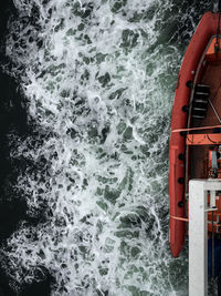 High angle view of water splashing in sea