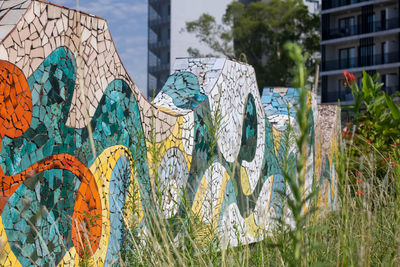 Close-up of graffiti on wall of building