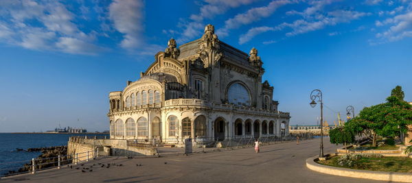 View of historic building against cloudy sky