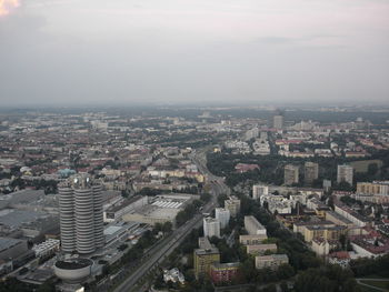 High angle view of buildings in city against sky